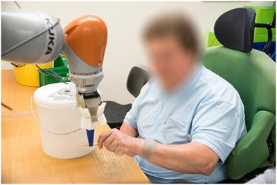 Acceptance of Industrial Collaborative Robots by People With Disabilities in Sheltered Workshops